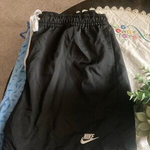 Nike Black swim/Shorts standard fit above the knee like new excellent condition